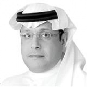 Why do some expatriates learn Arabic quickly?