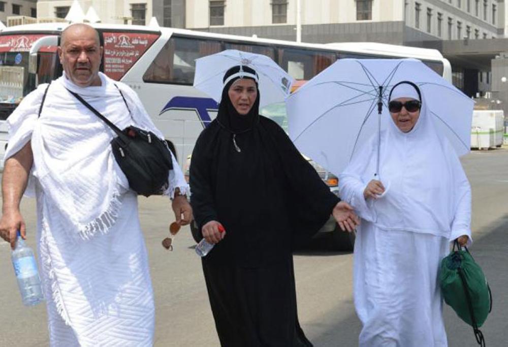 Pilgrims ascend to Mina at the start of the Haj rituals