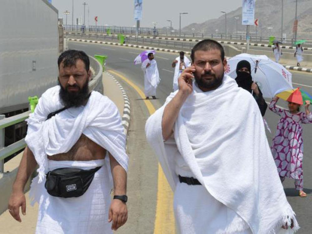 Pilgrims ascend to Mina at the start of the Haj rituals