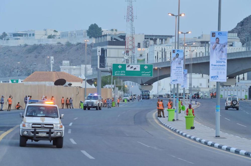Pilgrims ascend to Mina at the start of the Haj rituals