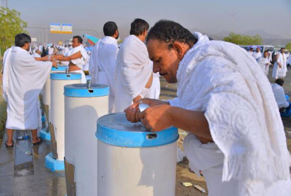 Pilgrims ascend to Mina at the start of the Haj rituals