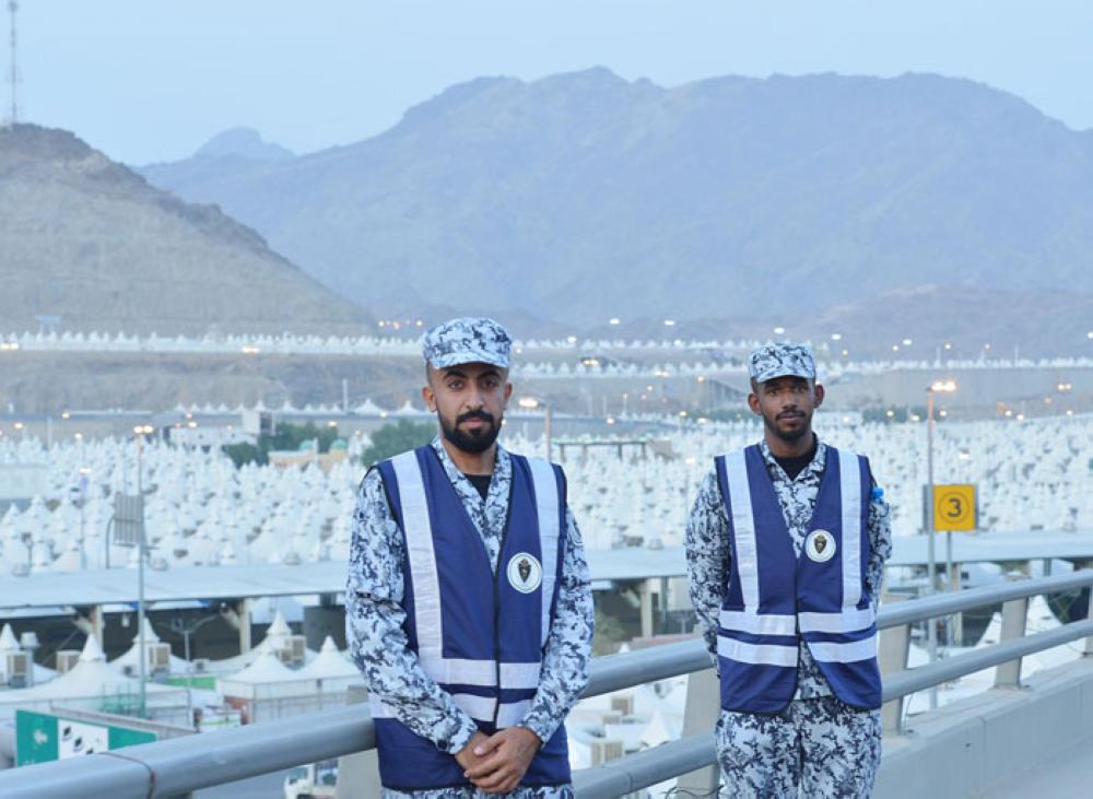 Pilgrims ascend to Mina at the start of the Haj rituals