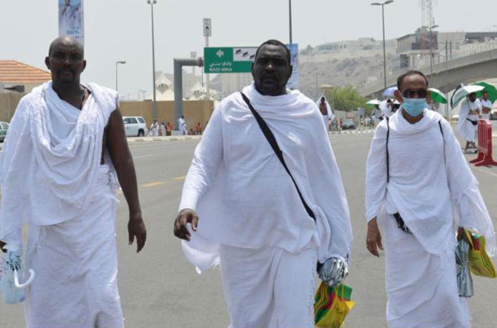 Pilgrims ascend to Mina at the start of the Haj rituals