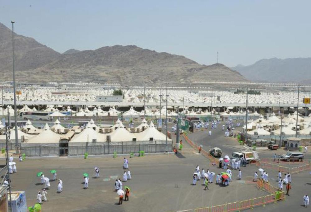 Pilgrims ascend to Mina at the start of the Haj rituals