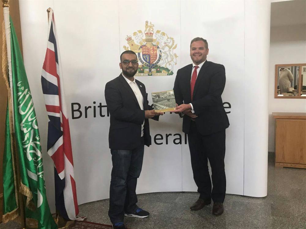 CEO Rashid Mogradia along with other members of the CBHUK pose with British Consul General Barrie Peach MBE, who displays the 10 Year 