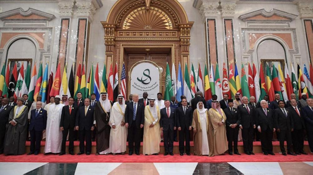 Custodian of the Two Holy Mosques King Salman and US President Donald Trump stand for a group photo with leaders of Arab and Muslim countries at the Arab Islamic American Summit in Riyadh on May 21, 2017. — AFP
