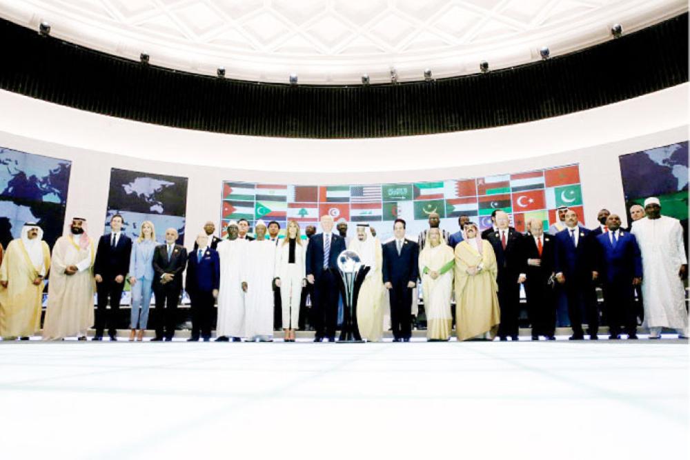 
Custodian of the Two Holy Mosques King Salman, US President Donald Trump and leaders of Muslim countries stand for a family photo at the Global Center for Combatting Extremist Ideology in Riyadh on Sunday. — Reuters