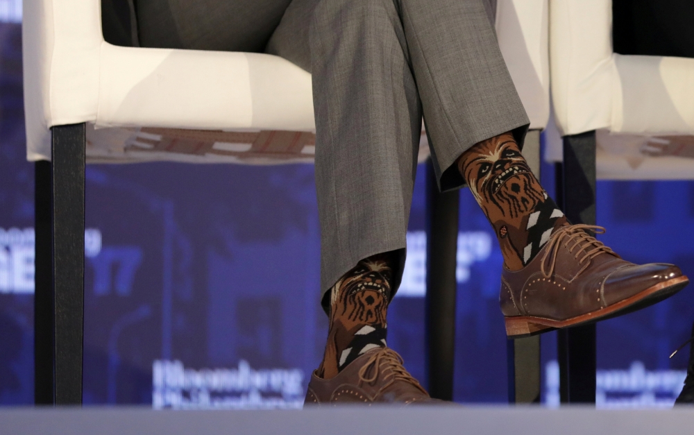 Canadian Prime Minister Justin Trudeau wears Chewbacca socks while participating in a panel discussion at a Bloomberg Global Business Forum panel event in New York City on Sept. 20. - Reuters