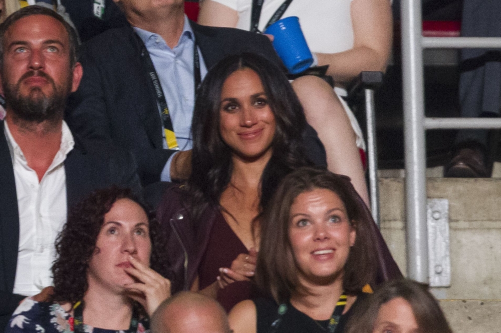 Actress Meghan Markle watches the opening ceremonies of the Invictus Games in Toronto, Ontario on Sunday. - AFP
