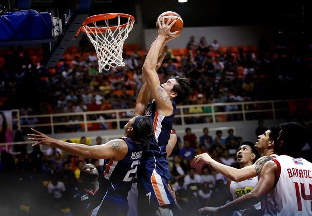 Meralco clobbers Star to move a game away from finals