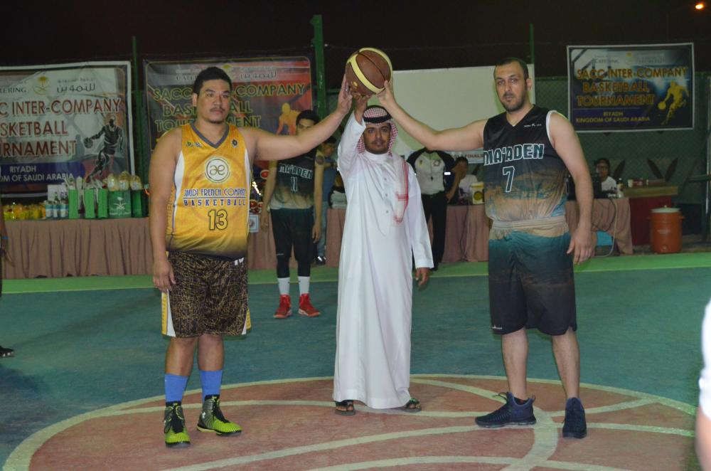 Champion team Saudi French Company – Lagardere Travel Retail Duty Free CEO, David Bisset, center, and Overall Event Organizer Turki Mohammed Al Zahrani.  