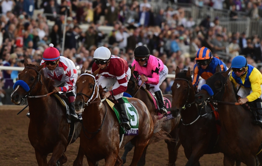 Gun Runner ridden by Florent Geroux (No. 5) wins the Breeders' Cup Classic on day two of the 2017 Breeders' Cup World Championship at Del Mar Race Track on Saturday in Del Mar, California. — AFP