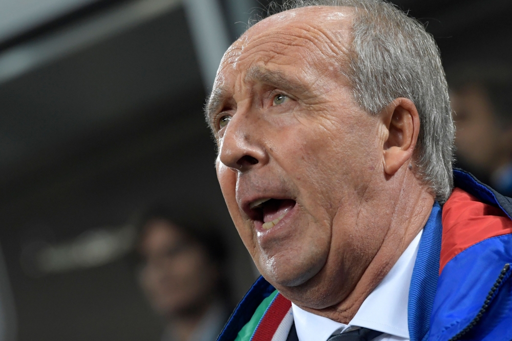 Italy's coach Giampiero Ventura sings Italy's natioal anthem prior the FIFA World Cup 2018 qualification football match between Italy and Sweden, on Monday at the San Siro stadium in Milan. — AFP