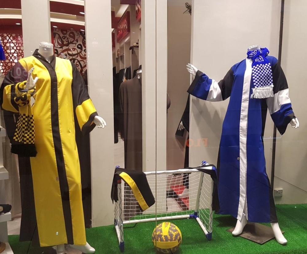 Abayas of local soccer
clubs in high demand