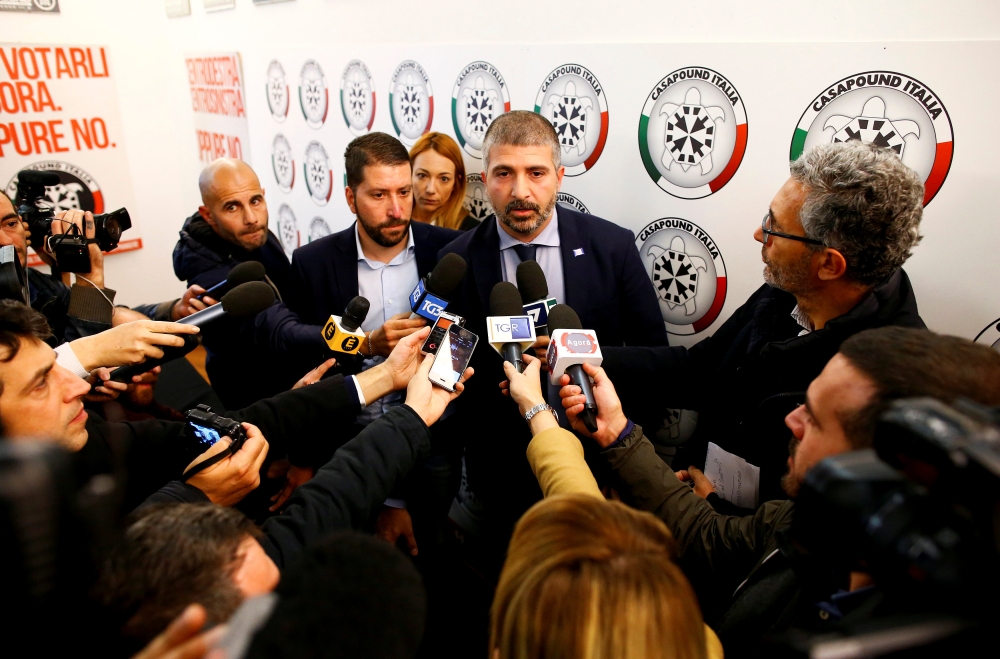 Vice president of the CasaPound party Simone Di Stefano talks with reporters during a news conference in their headquarters in Rome, Italy on Nov. 9. - Reuters