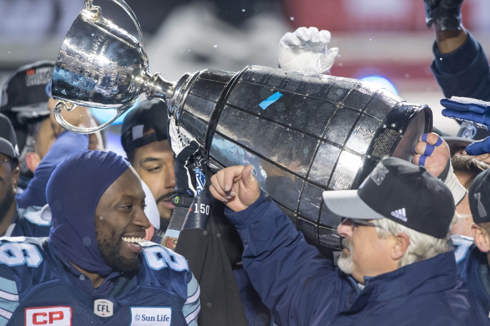 The Toronto  Argonauts hoist the Grey Cup after defeating the Calgary Stampeders at TD Place Stadium. The Argonauts defeated the Stampeders 27-24 to win the Grey Cup. — Reuters
