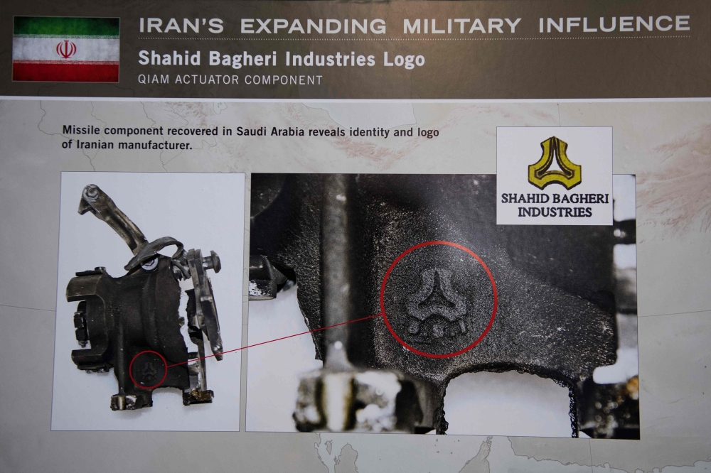 A placard showing a missile component recovered in Saudi Arabia reveals identity and logo of Iranian manufacturer Shahid Bagger Industries Logo after US Ambassador to the United Nations Nikki Haley unveiled previously classified information intending to prove Iran violated UNSCR 2231 by providing the Houthi rebels in Yemen with arms during a press conference at Joint Base Anacostia in Washington, DC, on December 14, 2017. Haley said Thursday that a missile fired by Houthi militants at Saudi Arabia last month had been made in Iran. 