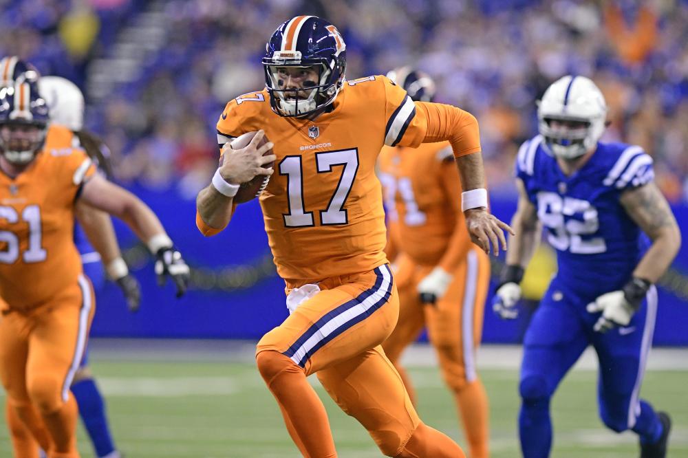 Denver Broncos’ quarterback Brock Osweiler runs toward the end zone in the second quarter against the Indianapolis Colts at Lucas Oil Stadium in Indianapolis Thursday. Reuters