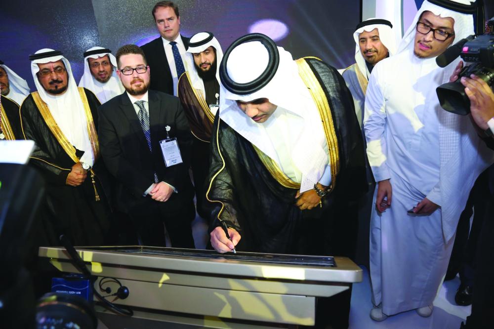 L to R: Dr. Abdullah Al-Shehri, governor of ECRA, Abdulrahman M. Al-Obayed, senior vice president human resources, Saudi Electricity Company, Zak Allen, Bismarck State College, Stephen Schlieman, economic officer at the US Consulate Jeddah, Dr. Fahad Al-Tuwaijri CEO, Colleges of Excellence, Ahmed S. Al-Essa, NPA executive director and Dr. Saleh Al-Awaji, deputy minister of electricity. — Courtesy photo