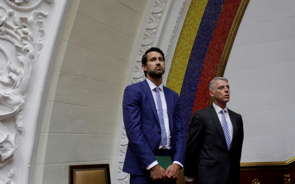 Craig Kowalik, left, political adviser to the embassy of Canada and Eduardo Porretti Charge d’Affaires of the embassy of Argentina attend a session of Venezuela’s opposition-controlled National Assembly in Caracas, Venezuela, in this  Aug. 2, 2017 file photo. — Reuters