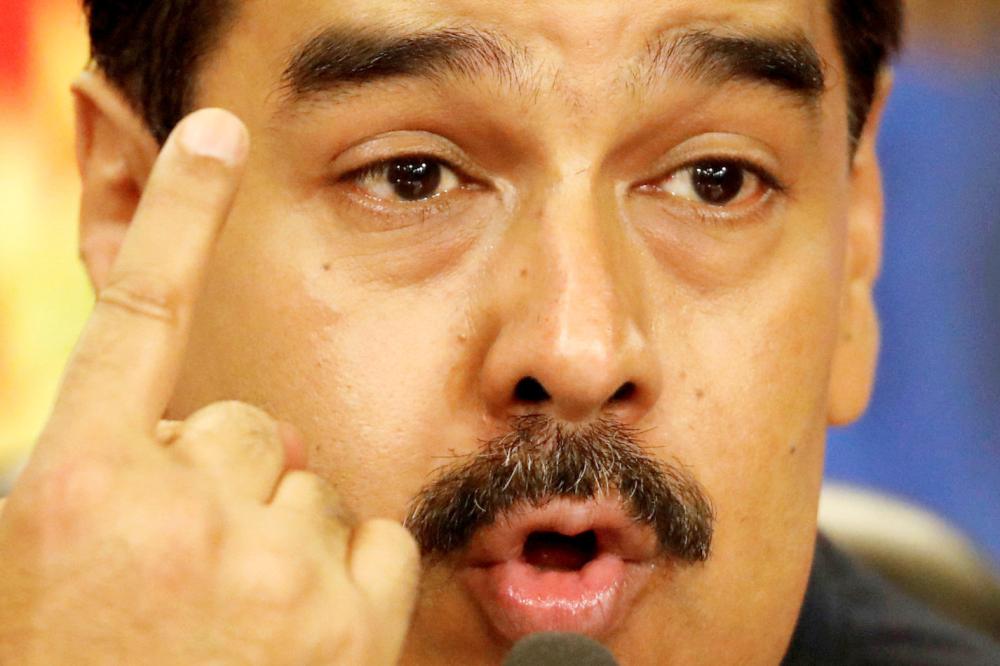 Venezuela’s President Nicolas Maduro talks to the media during a news conference at Miraflores Palace in Caracas in this Oct. 17, 2017 file photo. — Reuters