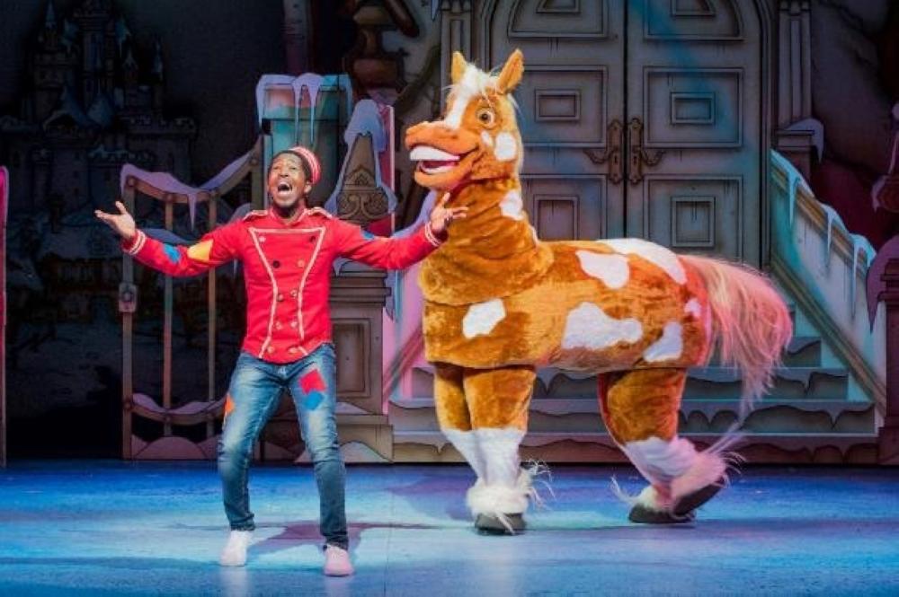 An actor is seen onstage during a pantomime performance in London in this undated file photo.