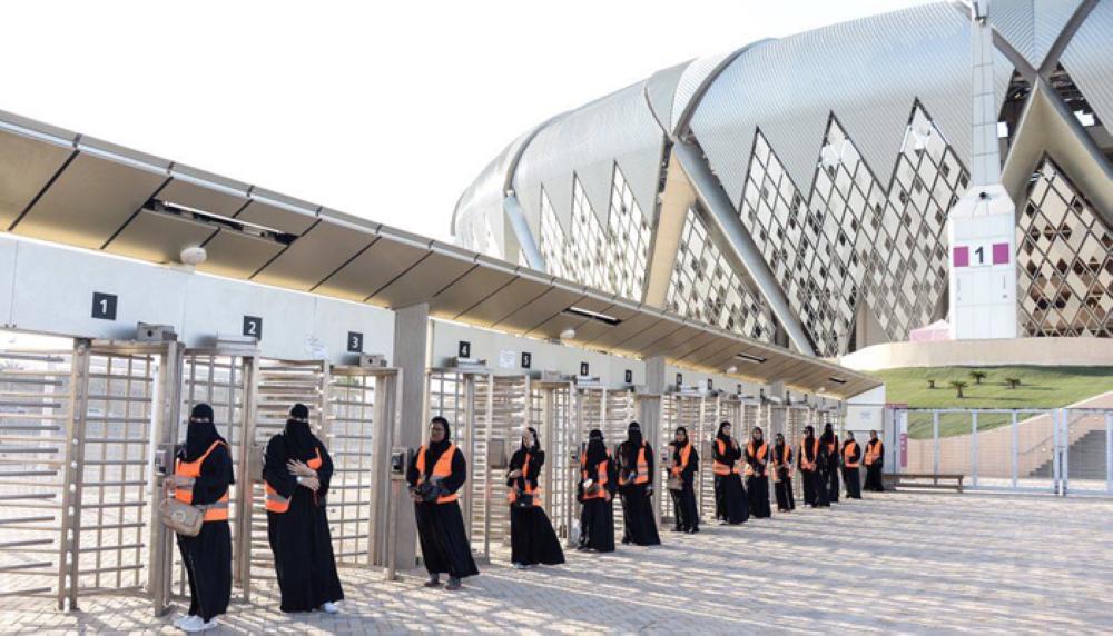 Saudi Women in scarves and hats cheer their clubs in Jeddah Stadium for the first time
