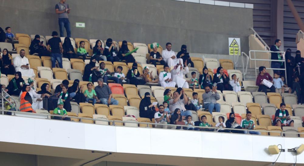 Saudi Women in scarves and hats cheer their clubs in Jeddah Stadium for the first time