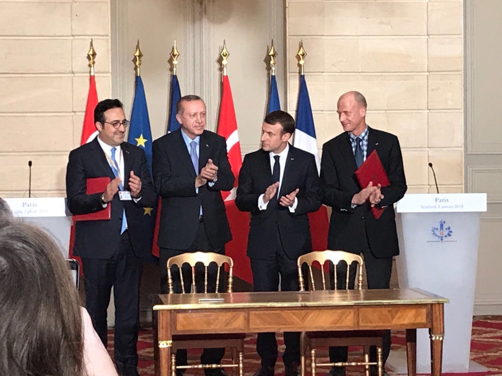 Turkish President Recep Tayyip Erdogan and French President Emmanuel Macron with Turkish Airlines and Airbus officials during the signing of a MoU to buy more aircraft. — Courtesy photo