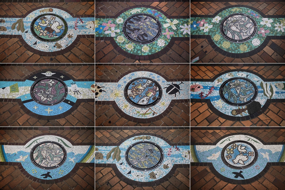 This combo photo shows designed manhole covers in Kawaguchi, Saitama prefecture. Japan's sewerage industry has found a way to clean up its dirty and smelly image: elaborately designed and colorful manhole covers with 12,000 local varieties nationwide — including, of course, a Hello Kitty design. — AFP