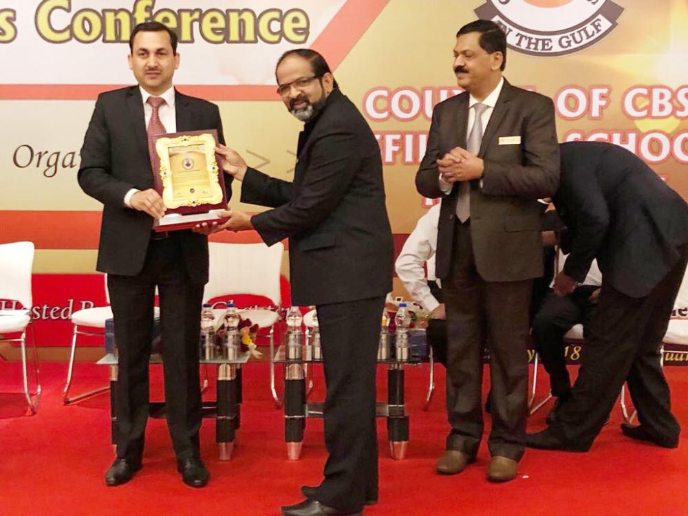 Dr. E.K Mohammad Shaffe, Head of Institution of International School, Dammam receiving award for IISD achievements at Gulf based schools conference held in Chennai recently. — Courtesy photo
