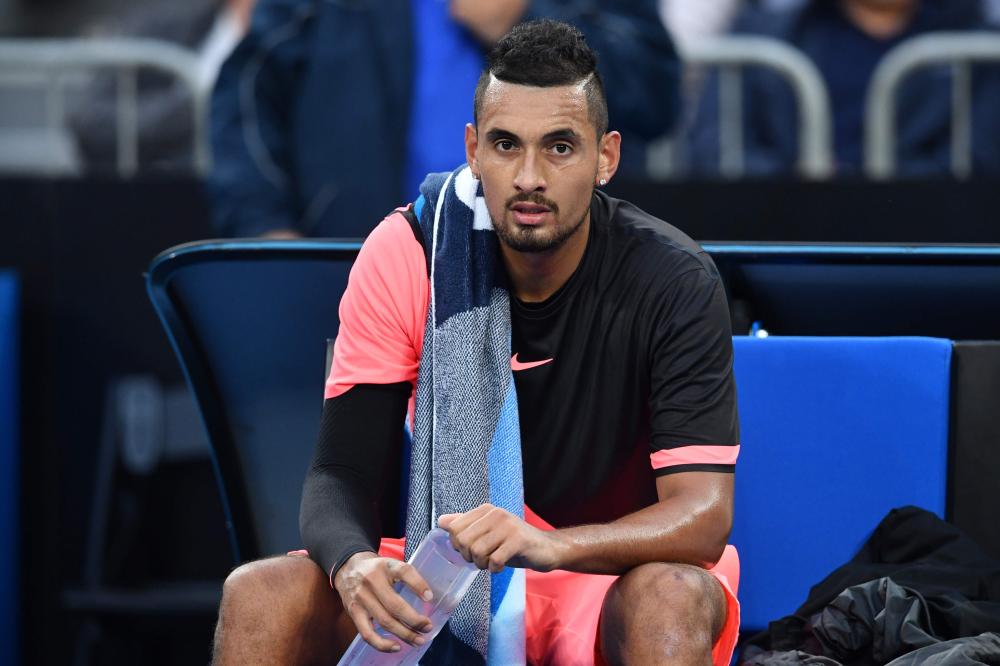 Australia’s Nick Kyrgios looks on during his match against Brazil’s Rogerio Dutra Silva at the Australian Open in Melbourne Monday. — AFP