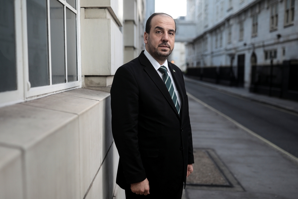 Nasr Hariri, chief negotiator for Syria's main opposition, poses for a photograph in central London. — Reuters