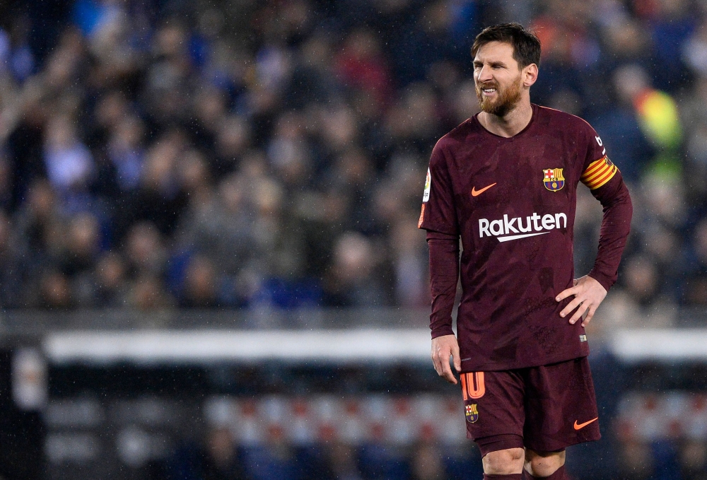 Barcelona's Argentinian forward Lionel Messi grimaces after missing a penalty kick during the Spanish 'Copa del Rey' (King's Cup) quarterfinal first leg football match between RCD Espanyol and FC Barcelona at the RCDE Stadium in Cornella de Llobregat on Wednesday. — AFP