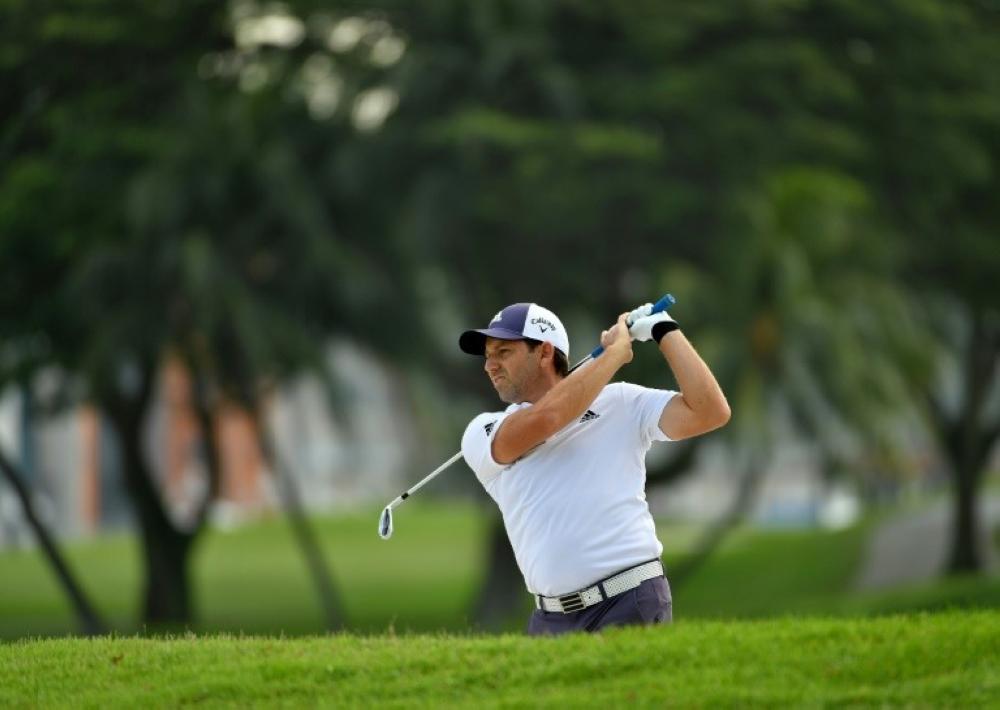 Masters champion Sergio Garcia got his 2018 campaign off to a good start at the Singapore Open on Thursday. — AFP