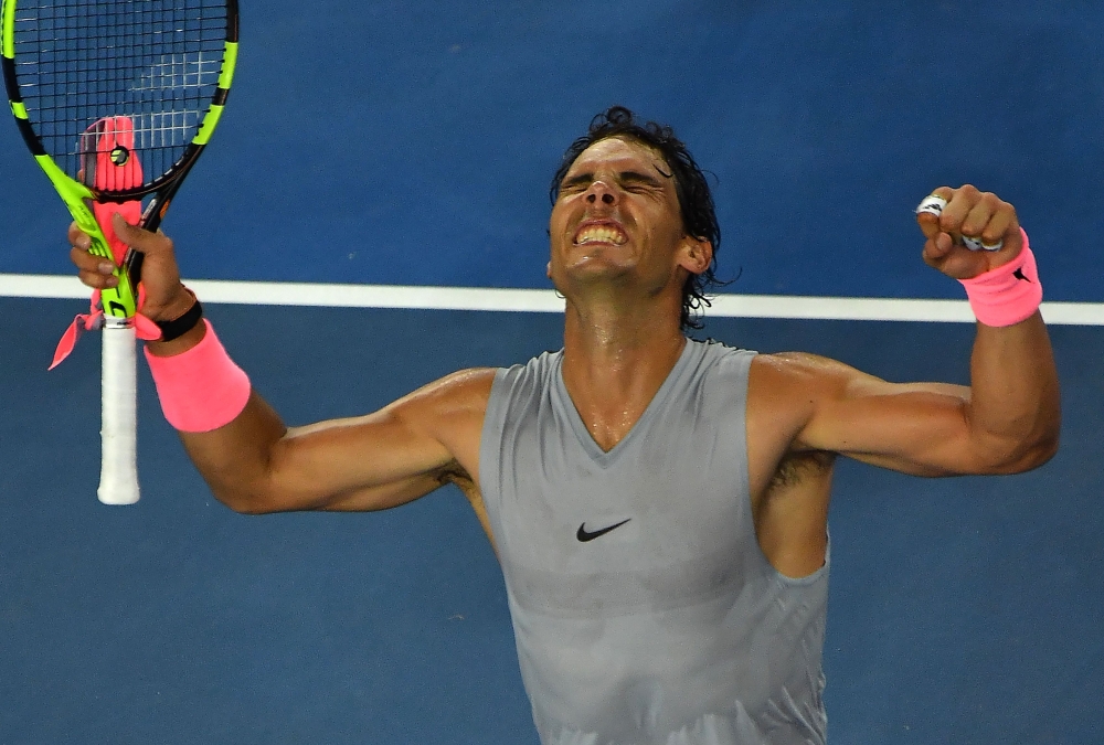 Spain's Rafael Nadal celebrates victory over Bosnia's Damir Dzumhur after their men's singles third round match on day five of the Australian Open tennis tournament in Melbourne on Friday. — AFP