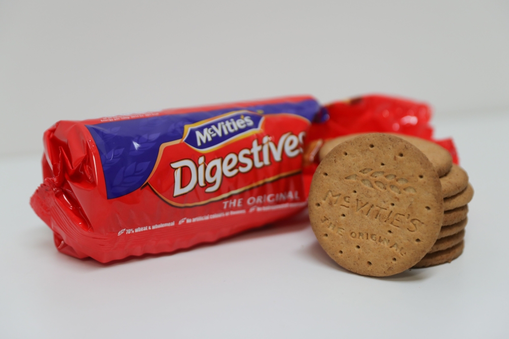 Biscuits from an opened 400g packet of McVitie's Digestives are pictured in London on Saturday. - AFP