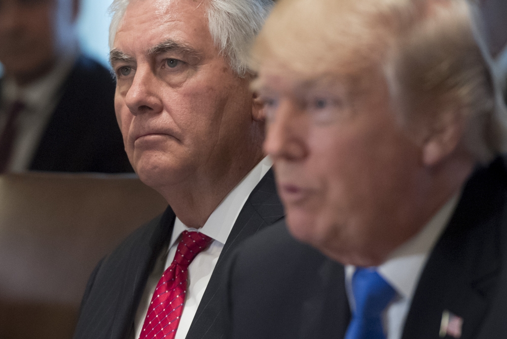 This file photo shows US President Donald Trump speaking alongside Secretary of State Rex Tillerson (L) during a Cabinet Meeting in the Cabinet Room at the White House in Washington, DC. — AFP