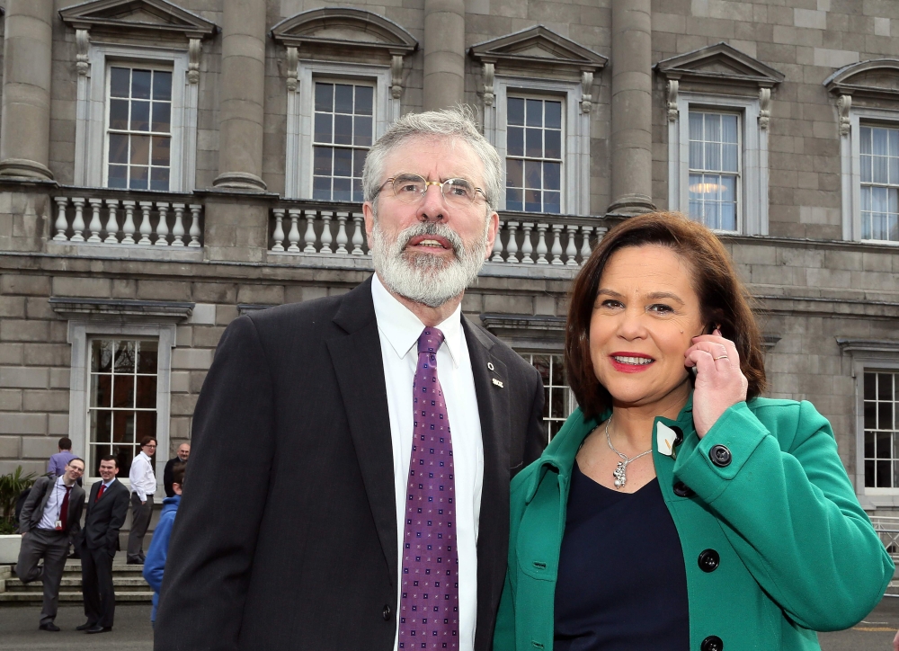This file photo shows Republican party Sinn Fein leader Gerry Adams (L) and Sinn Fein deputy leader Mary Lou McDonald outside the Irish parliament (Dail). — AFP