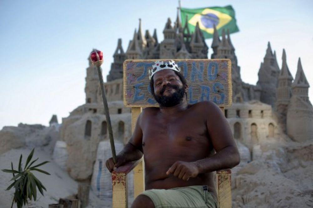 They say a man's home is his castle and Marcio Matolias has lived in his - albeit made of sand - on a beach in Rio de Janeiro for the last 22 years. - AFP
