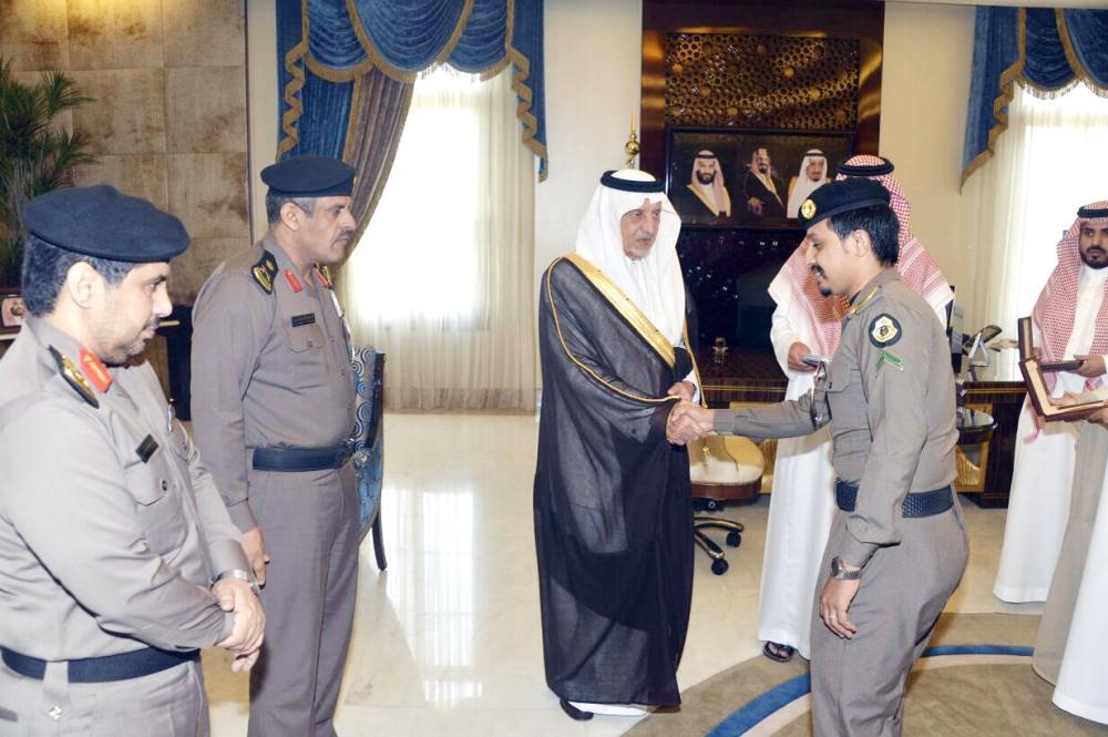 Makkah Emir Prince Khaled Al-Faisal honors the officers who arrested suspects in a kidnap attempt in Jeddah.