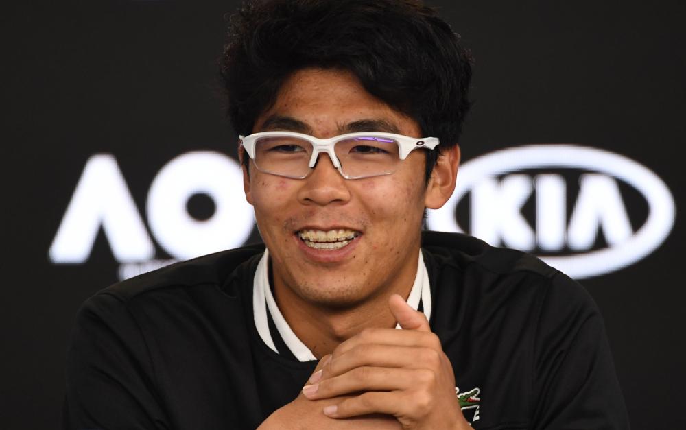 South Korea’s Chung Hyeon addresses a press conference after his victory over Serbia’s Novak Djokovic a the Australian Open Monday. — AFP