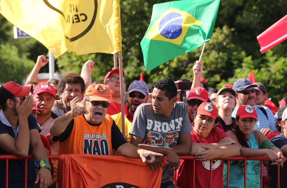 Supporters of former Brazilian president Luiz Inacio Lula da Silva protest before a court in Porto Alegre decides on his appeal against a corruption conviction that could bar him from running in the 2018 presidential race. — Reuters