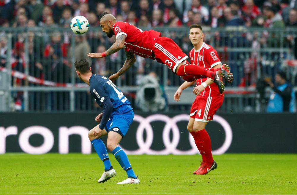 Bayern Munich's Arturo Vidal in action against TSG 1899 Hoffenheim during their Bundesliga match at Allianz Arena, Munich, Saturday. — Reuters