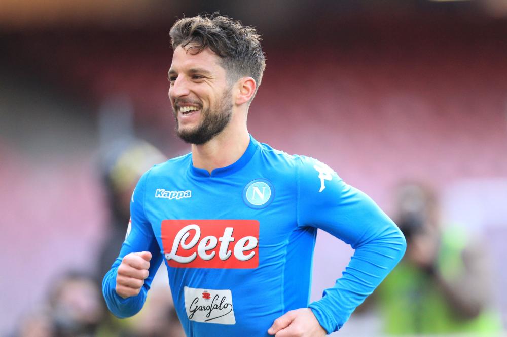 Napoli's Belgian striker Dries Mertens celebrates after scoring a goal against Bologna during their Italian Serie A match at the San Paolo Stadium Sunday. — AFP