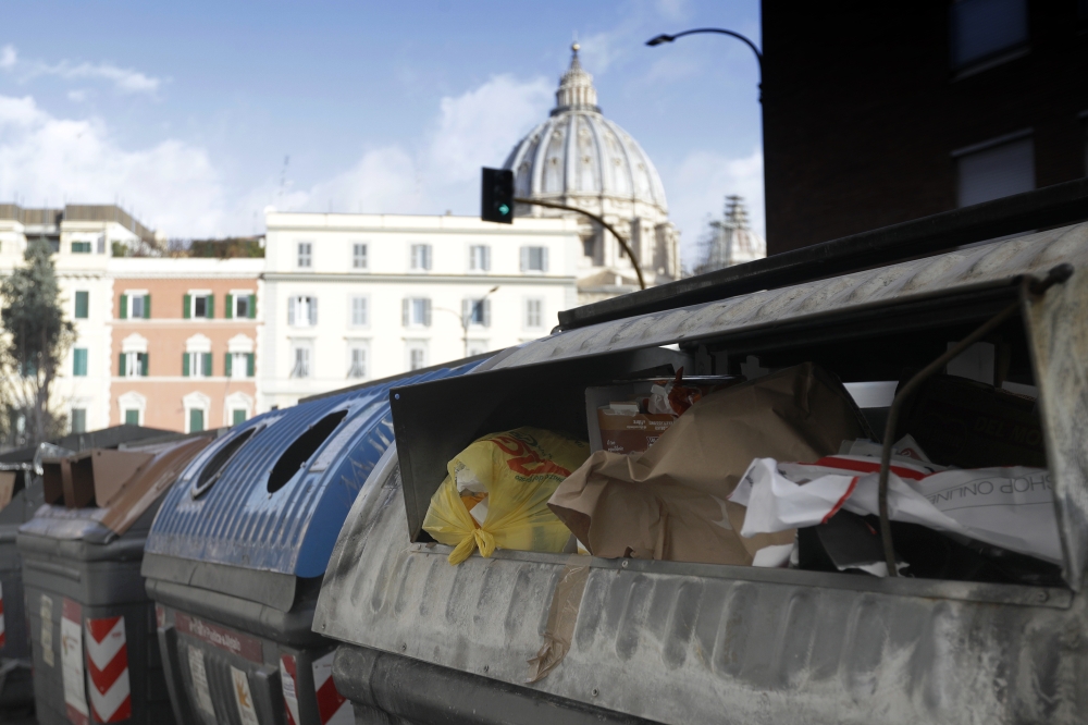 Trash overflows from garbage bins in Rome, Italy, in this Jan. 17, 2018 file photo. — AP