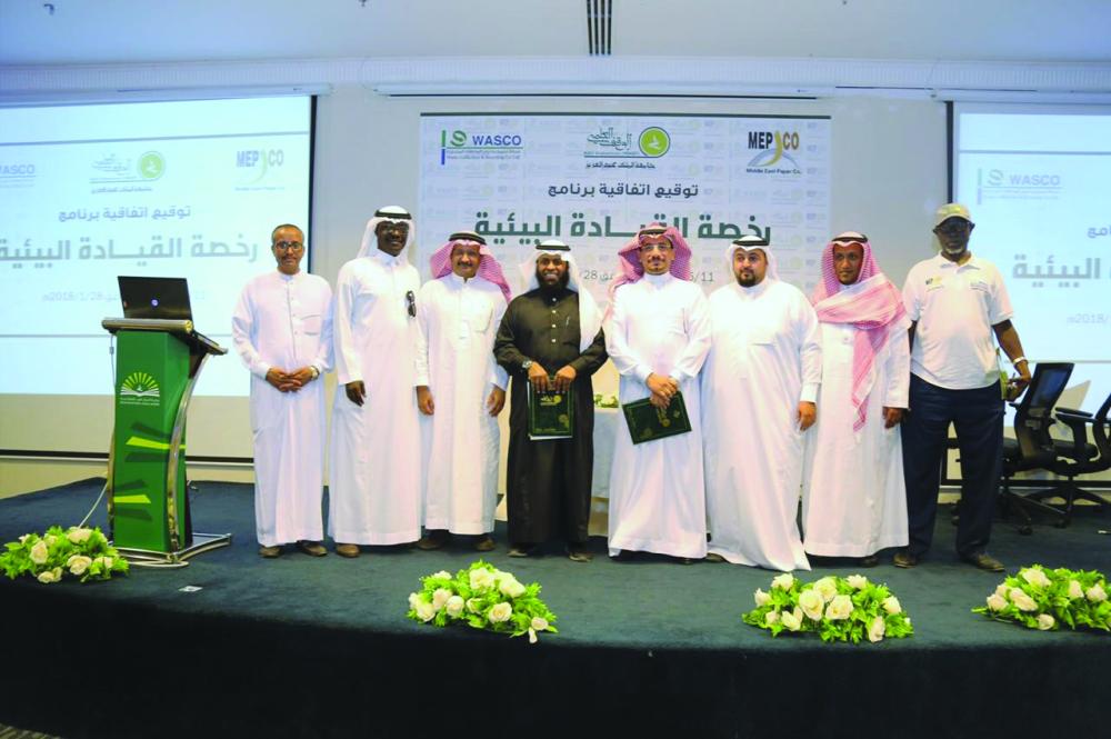 MEPCO, WASCO and King Abdulaziz University officials after signing the partnership agreement to launch leadership program for Saudis. — Courtesy photo