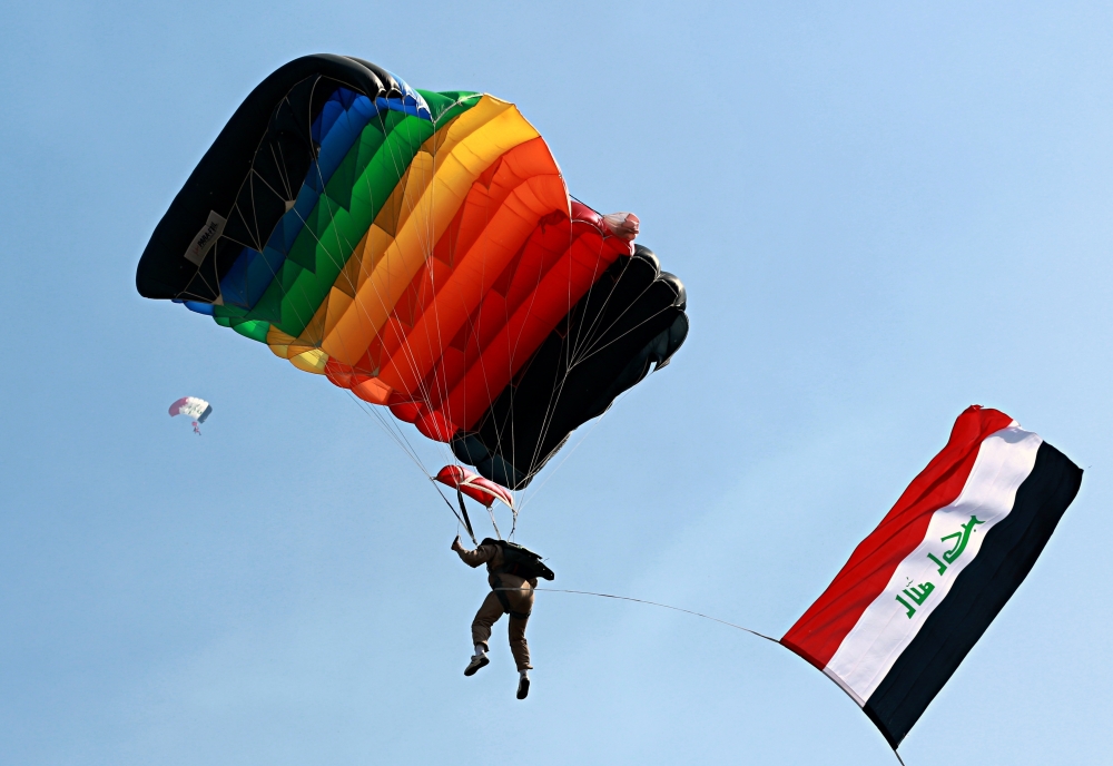 Members of Iraq's national skydiving team train in Baghdad, Iraq. — AP