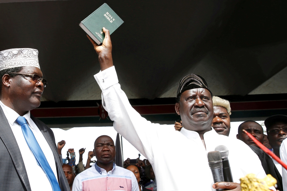 Kenyan opposition leader Raila Odinga of the National Super Alliance (NASA) takes a symbolic presidential oath of office in Nairobi, Kenya, in this Jan. 30, 2018 file photo. — Reuters