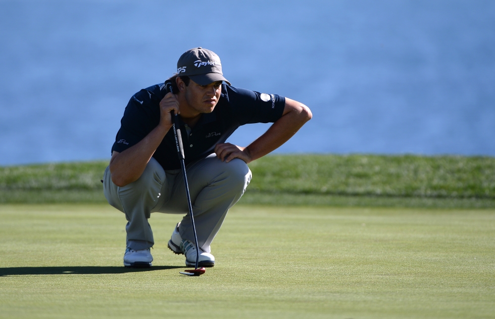 Beau Hossler lines up a put on the 18th green during the first round of the AT&T Pebble Beach Pro-Am golf tournament at Pebble Beach Golf Links.— Reuters